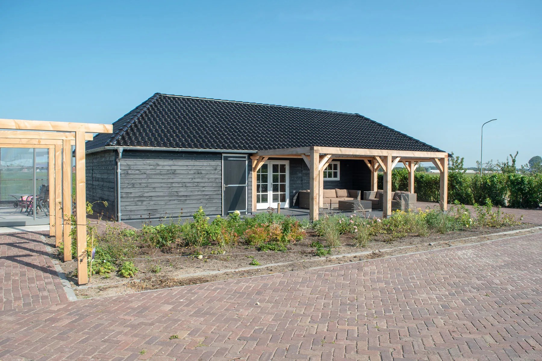 stolpschuur geïsoleerd inclusief carport